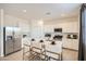 The kitchen showcases stainless steel appliances, a center island, and a stylish design at 4792 E Shasta Dr, San Tan Valley, AZ 85143