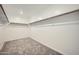 Spacious walk-in closet featuring carpeted flooring, with ample storage and shelving options at 4792 E Shasta Dr, San Tan Valley, AZ 85143