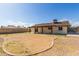 Large backyard with covered patio, offering ample space for outdoor living and entertaining at 4845 W Evans Dr, Glendale, AZ 85306