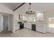 Updated kitchen features white cabinets, stainless appliances, farmhouse sink, and stylish backsplash at 4845 W Evans Dr, Glendale, AZ 85306