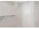Spacious walk-in closet with ample shelving and rod space, painted white at 4845 W Evans Dr, Glendale, AZ 85306