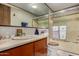 This bathroom features a sink, a toilet, and a shower with sliding doors at 49478 W Val Vista Rd, Maricopa, AZ 85139