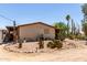 View of home exterior with desert landscaping including cacti and gravel at 49478 W Val Vista Rd, Maricopa, AZ 85139