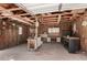View of a garage with wood walls, wood rafters and workbenches at 49478 W Val Vista Rd, Maricopa, AZ 85139