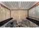 Relaxing hot tub underneath a covered enclosure, featuring a decorative net and warm lighting at 49478 W Val Vista Rd, Maricopa, AZ 85139