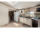Sunlit kitchen with a functional layout and nearby walk-in pantry for optimal organization at 49478 W Val Vista Rd, Maricopa, AZ 85139