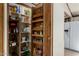 Spacious pantry with adjustable shelves for easy organization and convenient storage at 49478 W Val Vista Rd, Maricopa, AZ 85139
