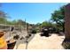 Scenic backyard featuring desert landscaping and an outdoor dining area at 6966 E Bramble Berry Ln, Scottsdale, AZ 85266