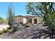 Charming home featuring desert landscaping, mature trees and a two car garage at 6966 E Bramble Berry Ln, Scottsdale, AZ 85266