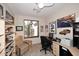 Office space featuring tile floors, natural light, neutral walls, and a ceiling fan at 6966 E Bramble Berry Ln, Scottsdale, AZ 85266