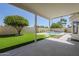 Inviting backyard featuring a covered patio, pool, and mature landscaping at 7144 E Lakeview Ave, Mesa, AZ 85209