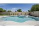Swimming pool and spa with a privacy wall, perfect for outdoor relaxation at 7144 E Lakeview Ave, Mesa, AZ 85209