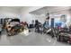 Expansive garage with epoxy floors, offering ample space for vehicles, storage, and projects at 7694 W Desert Spoon Dr, Peoria, AZ 85383