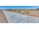 Well-maintained community walking path provides a scenic route for exercise and leisurely strolls at 7694 W Desert Spoon Dr, Peoria, AZ 85383