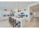 Modern kitchen featuring a large island with seating, stainless steel appliances, and ample cabinet space at 870 W Peralta Pass, Apache Junction, AZ 85120