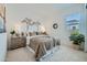 Serene main bedroom with a king-size bed, neutral tones, and a stylish nightstand at 870 W Peralta Pass, Apache Junction, AZ 85120