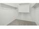 Walk-in closet with ample storage featuring rods and shelves at 905 S Canal Dr # 17, Chandler, AZ 85225