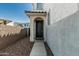 Front door featuring a covered porch and a gravel walkway at 905 S Canal Dr # 17, Chandler, AZ 85225