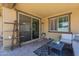 Covered patio features pavers, plants and outdoor seating area at 9752 E Torino Ave, Mesa, AZ 85212
