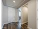 Bright entryway with wood floors, neutral walls, and an open view into other rooms at 9752 E Torino Ave, Mesa, AZ 85212