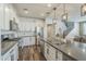 Beautiful kitchen features an island with seating, stainless appliances, and modern finishes at 9752 E Torino Ave, Mesa, AZ 85212