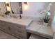 Bright bathroom features double sinks, decorative lighting and a make up vanity at 10023 E Sunnyslope Ln, Scottsdale, AZ 85258