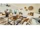 Spacious living room with large windows, hardwood floors, and modern decor at 10023 E Sunnyslope Ln, Scottsdale, AZ 85258
