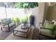 Cozy outdoor patio with comfortable seating and lush greenery for relaxation at 10023 E Sunnyslope Ln, Scottsdale, AZ 85258