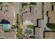 An aerial view of a luxury home showing the pool and well landscaped yard at 10033 W Jj Ranch Rd, Peoria, AZ 85383