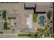 Aerial view of the entire property showing the pool, playground, and well landscaped yard at 10033 W Jj Ranch Rd, Peoria, AZ 85383