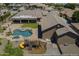Aerial view of the pool, outdoor living and play area at 10033 W Jj Ranch Rd, Peoria, AZ 85383