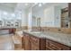 Luxurious bathroom featuring granite countertops, double sinks, and large tub at 10033 W Jj Ranch Rd, Peoria, AZ 85383