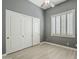 Bedroom with a ceiling fan and a double-door closet at 10033 W Jj Ranch Rd, Peoria, AZ 85383