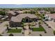 Stunning home featuring desert landscaping, palm trees and a stone facade at 10033 W Jj Ranch Rd, Peoria, AZ 85383