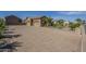 Beautiful home with large paved drive leading to a 3-car garage at 10033 W Jj Ranch Rd, Peoria, AZ 85383