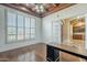 Bright office features custom shelving, plantation shutters, and an arched doorway at 10033 W Jj Ranch Rd, Peoria, AZ 85383