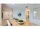 Dining area showcasing stylish decor, a long table, and modern lighting at 12039 E Primrose Ln, Florence, AZ 85132