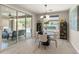 Elegant dining area with access to outdoor patio and pool area at 13186 W Via Dona Rd, Peoria, AZ 85383