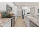 Stylish kitchen with granite countertops, stainless steel appliances, and modern backsplash at 13186 W Via Dona Rd, Peoria, AZ 85383