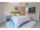 Relaxing main bedroom featuring a neutral color palette, carpet, and ample natural light at 13186 W Via Dona Rd, Peoria, AZ 85383