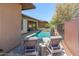 Backyard featuring a sparkling pool, hot tub, and inviting lounge chairs, ideal for relaxation and outdoor fun at 13186 W Via Dona Rd, Peoria, AZ 85383