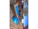 Stunning backyard pool and spa feature beautiful travertine tile and a calming waterfall creating an inviting oasis at 13186 W Via Dona Rd, Peoria, AZ 85383