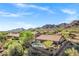 Expansive aerial view of desert home with private pool and mountain views at 13945 E Gail Rd, Scottsdale, AZ 85259
