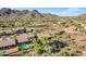 Stunning aerial view of desert homes featuring private pools and desert landscaping at 13945 E Gail Rd, Scottsdale, AZ 85259