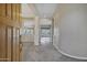 Open-concept foyer featuring neutral walls, tile flooring, and an open view into the home's living spaces at 13945 E Gail Rd, Scottsdale, AZ 85259