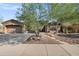Charming single-story home with a three car garage and desert landscaping at 13945 E Gail Rd, Scottsdale, AZ 85259