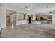 Open-concept living area with an island kitchen, tile floors, and an abundance of space at 13945 E Gail Rd, Scottsdale, AZ 85259