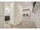Well-lit walk-in closet with built-in shelving, offering ample storage space and organization options at 1415 W J Waltz Way, Apache Junction, AZ 85120