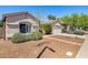 Attractive single-level home with well-kept landscaping and a convenient two-car garage at 14819 W Lupine Ln, Surprise, AZ 85374