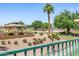 Picturesque park view with gazebo, mature trees, and well-maintained landscaping, perfect for outdoor enjoyment and relaxation at 14819 W Lupine Ln, Surprise, AZ 85374